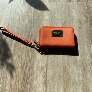 Michael Kors orange wrist wallet